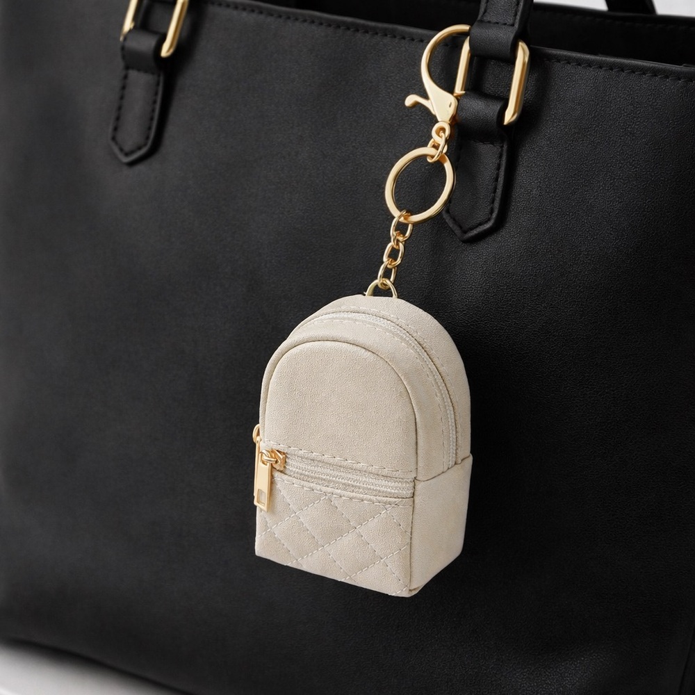 Mini Cream Backpack Keychain with Gold Accents